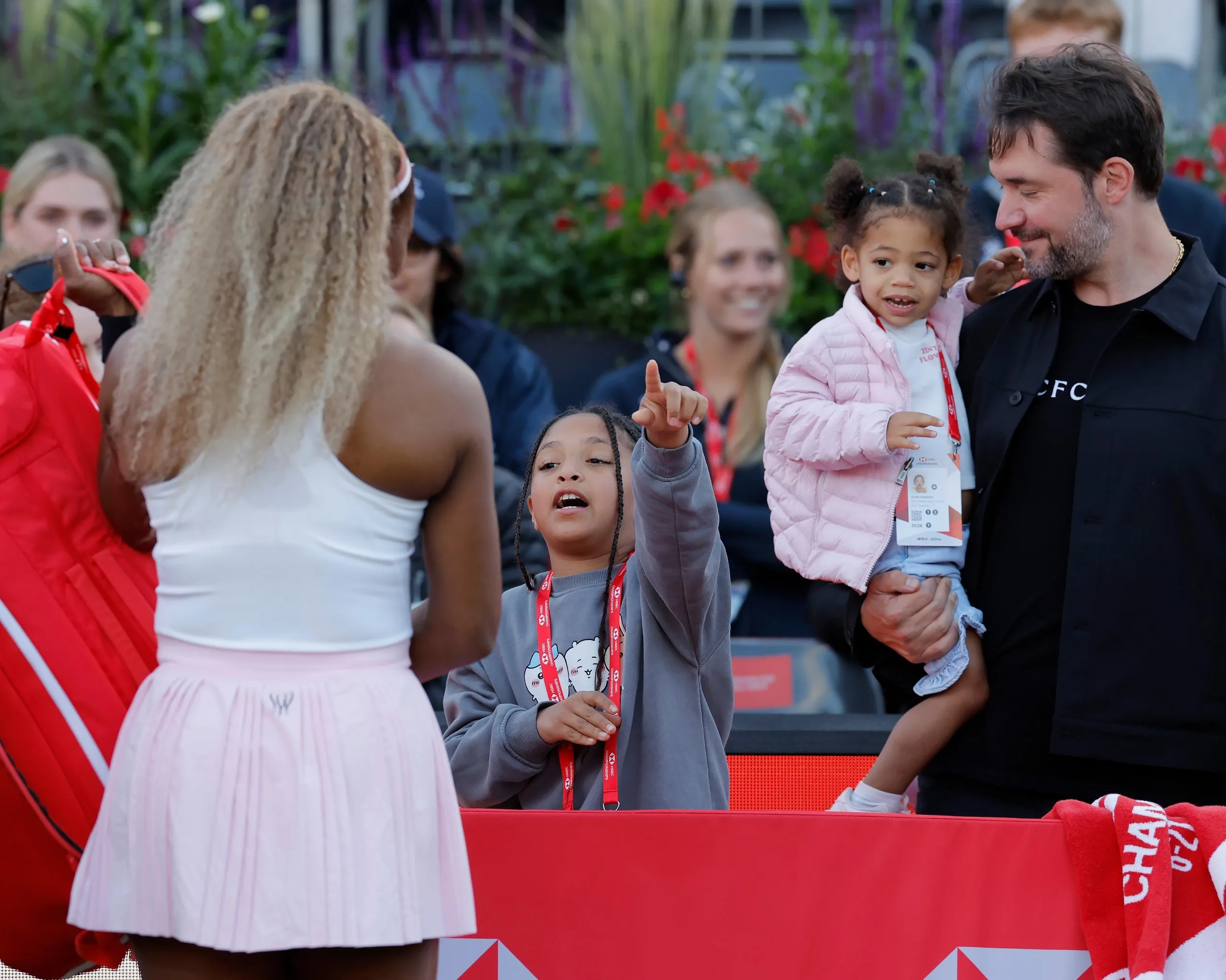 Serena Williams is greeted by her daughters and her husband Alexis Ohanian