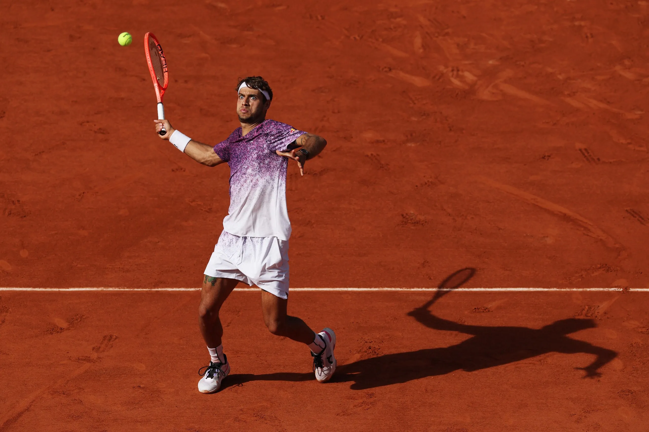 Flavio Cobolli of Italy anticipates a forehand against Alexander Zverev