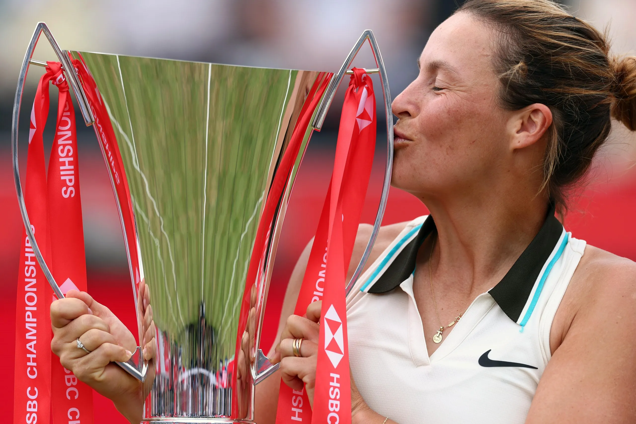 Tatjana Maria celebrates with the trophy at Queen’s last year